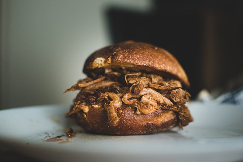 Pulled pork sandwich loaded with coleslaw